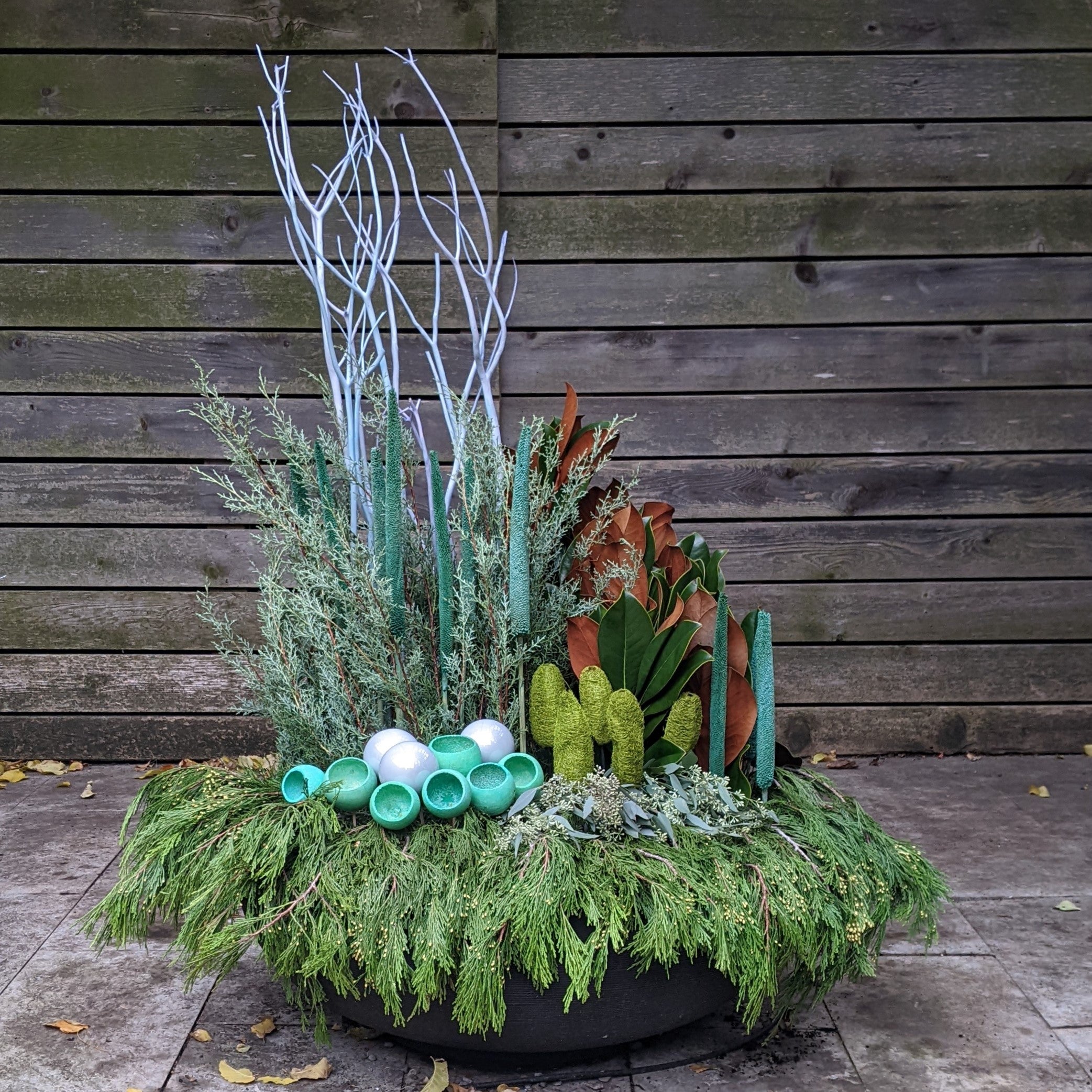 Winter planter with aqua ornaments